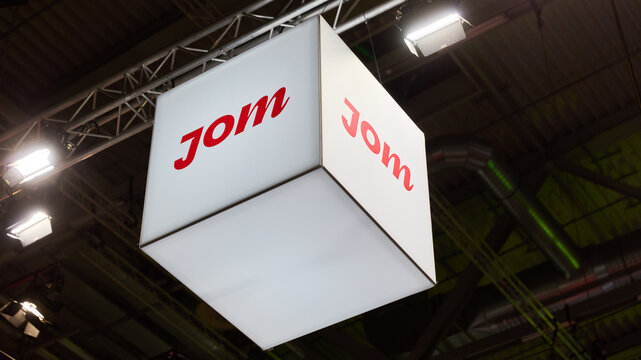 COLOGNE, GERMANY - SEPTEMBER 24th 2026 - Photo of JOM (JOM J&auml;schke Operational Media GmbH) logo at DMEXCO tradeshow