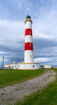 Tarbat Ness Lighthouse, built by Robert Stevenson, situated near the village of Portmahamock, Highland, Scotland, Uk.