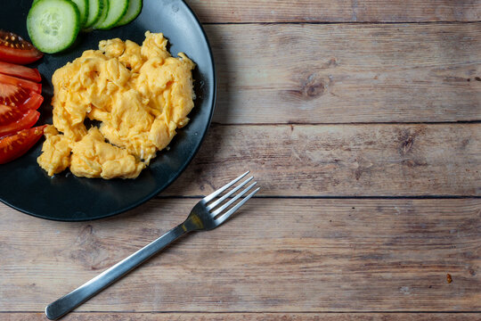 Scrambled Eggs with Fresh Tomato and Cucumber