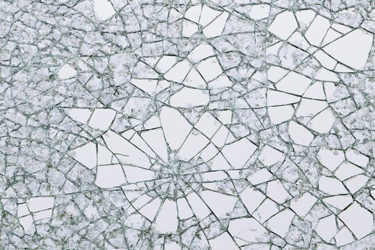 The Cracked Ice Pattern Closeup: Fractal Starburst Shards and Geometric Texture