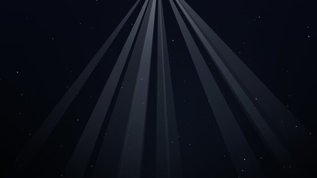 White cinematic light beams shining down on a dark background
