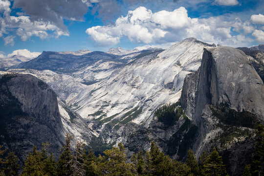 Panoramic landscape of Half Dome and Yosemite Valley from Sentinel Dome trail in California