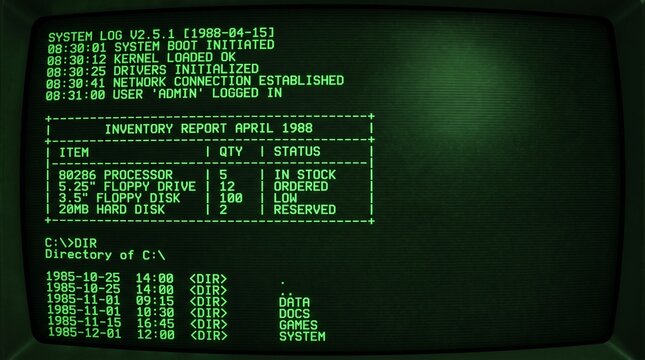 Green text on a retro computer monitor showing a system log and directory listing in a dark room with vintage