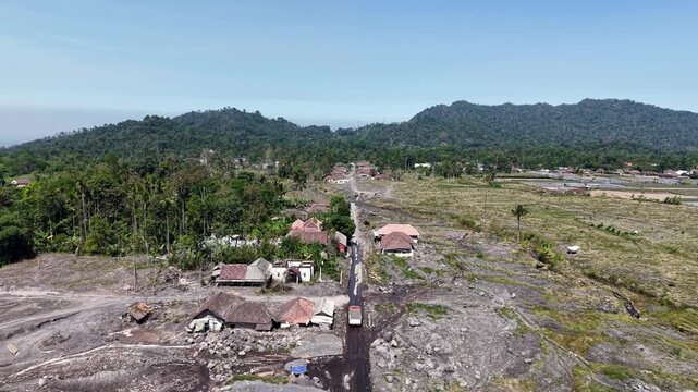 Drone panorama of abandoned supiturang village devastated by lava and ash from Mount Semeru