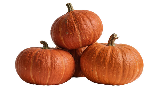 Three ripe orange pumpkins stacked together, isolated on transparent background