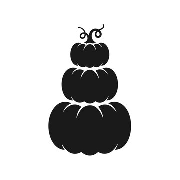Stacked black halloween pumpkins vector silhouette illustration on white