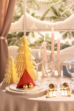 Cozy Vertical Christmas Place Setting with Candlelight