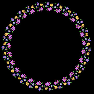 Delicate Oval Floral Wreath with Colorful Tiny Blossoms and Green Leaves on Black Background