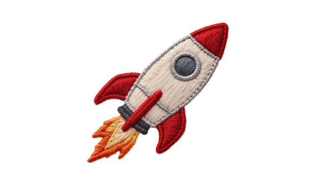Embroidered red and white rocket with orange flames, isolated on transparent background