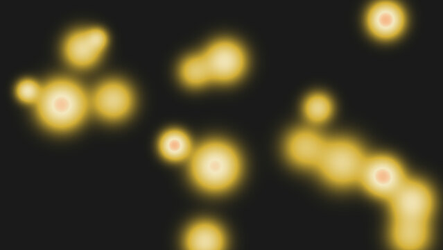 Glowing christmas bokeh lights floating on dark festive background