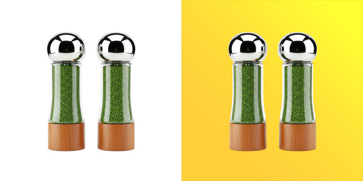 Two glass salt and pepper shakers with metallic silver tops and wooden bases, filled with green herbs, isolated on a white background, studio shot