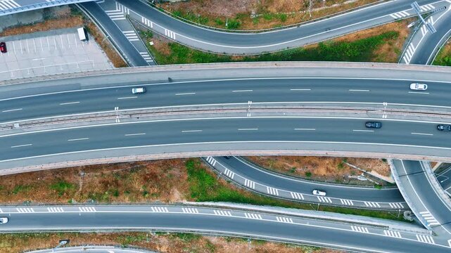 The main, multi-lane horizontal road carrying vehicles across the city. The D1 Motorway, multi-level stack segment of the Rondel / Prievoz interchange in Bratislava, Slovakia. Top view.