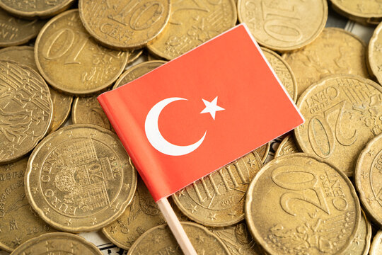 Turkey flag on coins background for finance banking business.