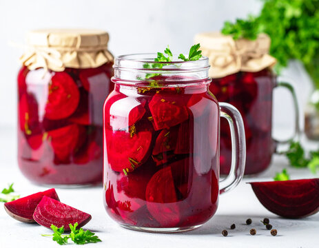 Pickled sliced beets in mason jars. AI