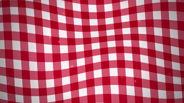 Red and white gingham picnic tablecloth background, with subtle floating, particles checkered