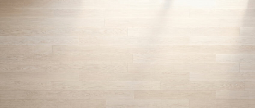 Hardwood floor surface reveals subtle timber grain and horizontal plank patterns. Bright laminate wood flooring creates serene minimalist backdrop ideal for contemporary architecture design.