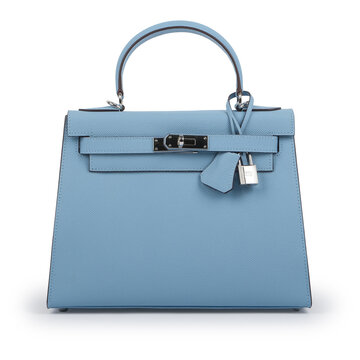 Front view of a light blue structured womens handbag with top handle, silver tone turn lock and decorative padlock isolated on white.