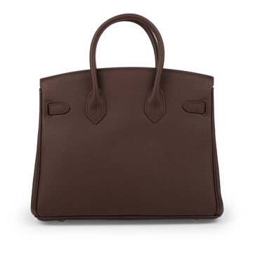 Back view of a dark brown structured womens handbag with textured leather, clean classic silhouette and double top handles isolated on a white background.