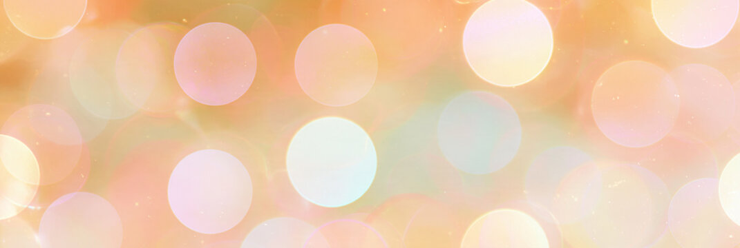 Abstraktes Bokeh in Orange, Gelb und Rosa mit weichen Lichtkreisen