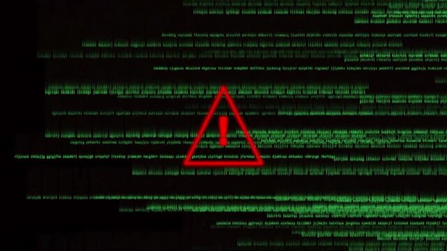 Warning sign with flashing red alert symbol over scrolling green computer code background