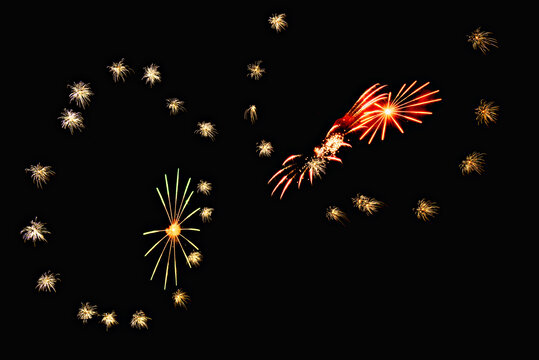 Fireworks lighting up the night sky. Pyrotechnics, abstract	