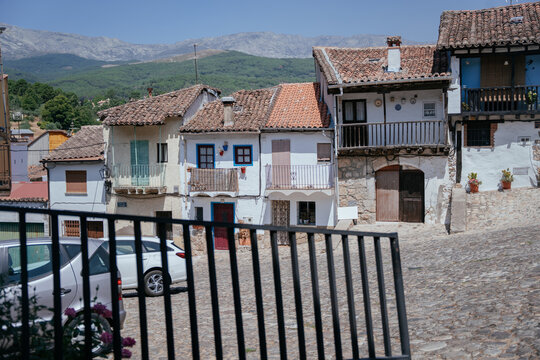 Traditional Whitewashed Houses and Mountain View in a Small Spanish Village