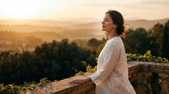 Mature Indian Woman Practicing Mindful Deep Breathing at Golden Hour Sunset