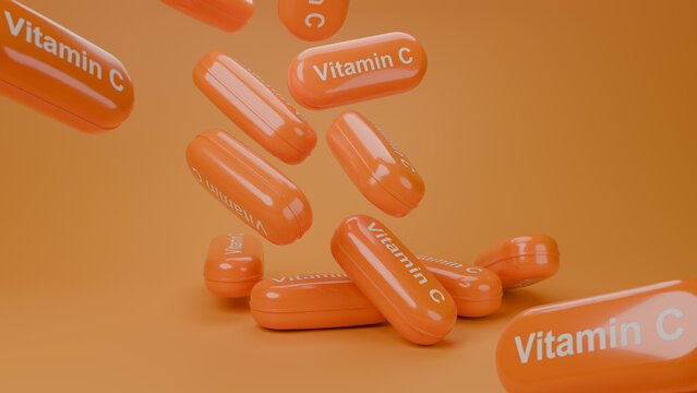 3D render of multiple orange glossy Vitamin C supplement capsules falling on orange background