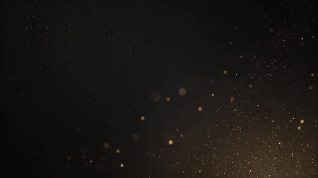 Golden dust particles shimmering and swirling slowly across deep black space creating an ethereal luxury background