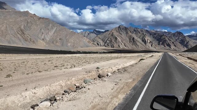 driving through the roads of Ladakh in the Indian Himalayas