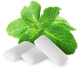 Menthol chewing gum pieces and green mint leaves isolated on white © New Africa