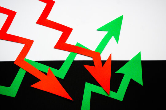 Intersecting decline and growth charts.
