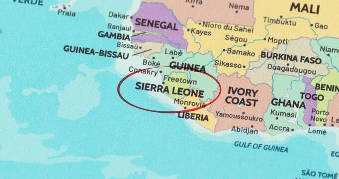 Detailed view of a red circle marking to sierra leone on a modern political world map