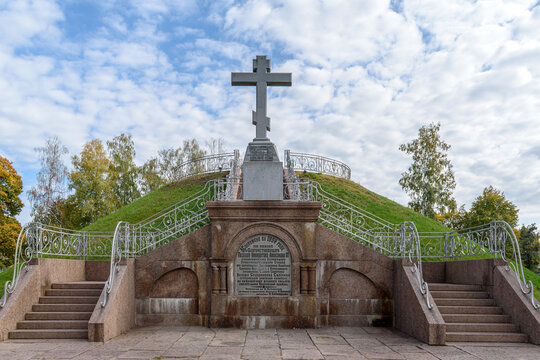 Front view of the historic 1894 memorial complex with stairs and a cross on the Poltava battlefield. POLTAVA, UKRAINE - OCTOBER 11, 2026