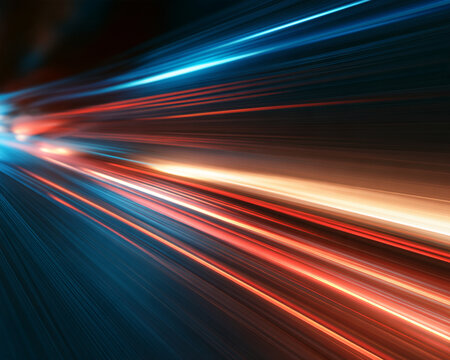 Dynamic streaks of blue and red light converge diagonally across a dark background. The bright linear trails vary in intensity and thickness, creating a vibrant motion effect.