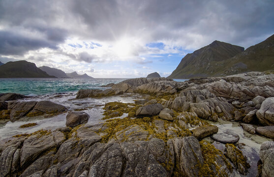 Dramatic rocky coastline at Haukland Beach near Leknes in the Lofoten Islands, Norway