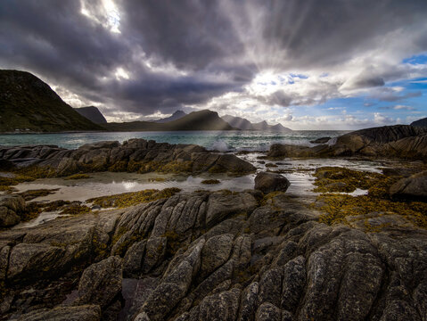 Dramatic rocky coastline at Haukland Beach near Leknes in the Lofoten Islands, Norway