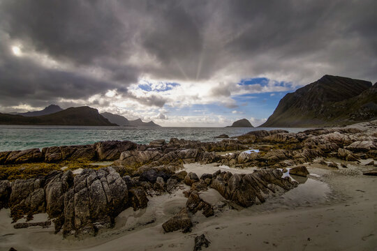 Dramatic rocky coastline at Haukland Beach near Leknes in the Lofoten Islands, Norway