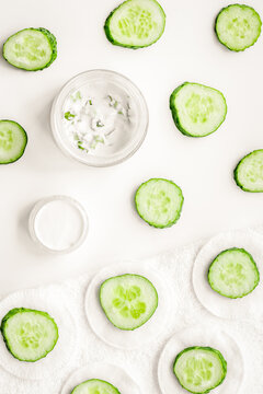 Cucumber moisturising cream or mask pattern. White background top view