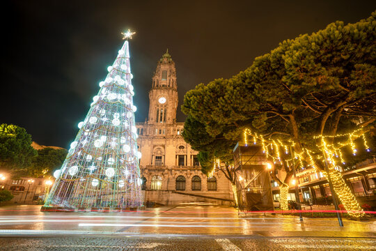 Illuminated Christmas Tree beside a Porto Church