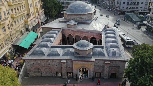 60fps horizontal drone shot pulling back from Hamza Bey Mosque in Thessaloniki
