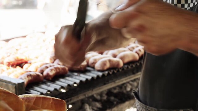 Close Up View Of Hands Sharpening Knife With Steel Rod At Choripan Street Stand - 4K