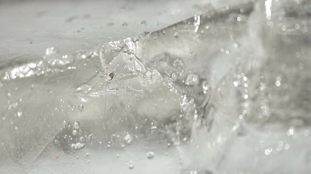 Frozen Ice surface and reflection .Cold weather and frosts wallpaper.Chunks of crushed ice structure.4k footage