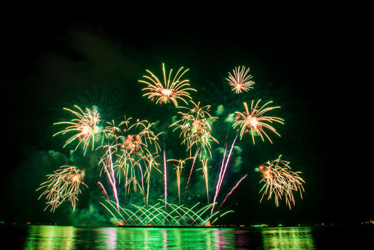 Green Firework celebrate anniversary happy new year 2026, 4th of july holiday festival. colorful firework night time to celebrate national holiday. countdown new year party 2027 background. Countdown