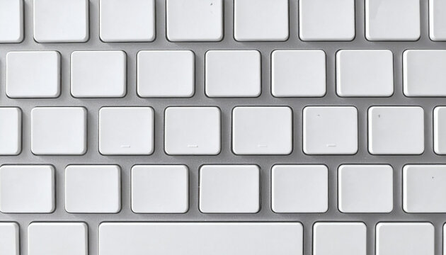Computer keyboard keys close up shot with blank white buttons on a metallic silver background for technology communication concepts