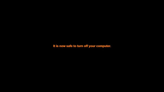 A microstock-safe retro animation that cuts instantly from a classic OS shutdown dialog to the legendary, static orange 'It is now safe to turn off yo.