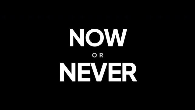 Now or never motivational text appearing on black background. 4K video