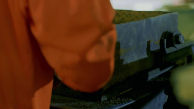 Fresh concrete block curing on steel stand