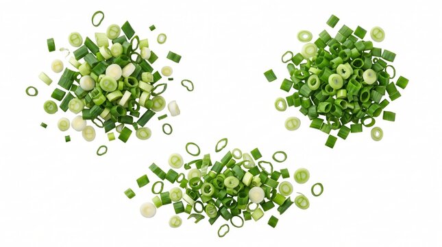 Three piles of freshly chopped green onions, sliced scallion rings arranged on a white background, top-down view of spring onion pieces