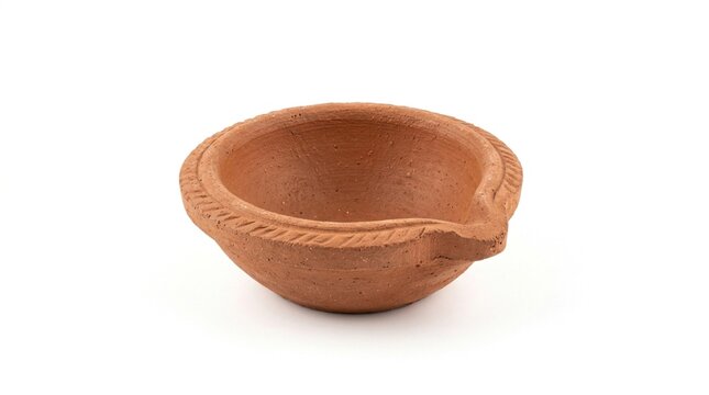 Traditional Unlit Terracotta Diya Oil Lamp on a Clean Neutral Background for Diwali